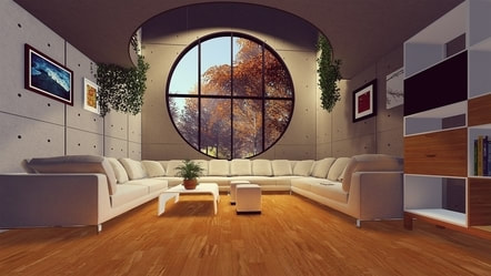 Picture of a beautiful, modern living room. U- form sofa and a gorgeous round window that provides view over the garden.